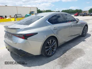 2023 Lexus IS with VIN JTHGZ1E23P5028682, listed as a IAAI auction lot 42051062 with 20,239 mi miles. Bid and sale history available at carsss.com. Image 4.
