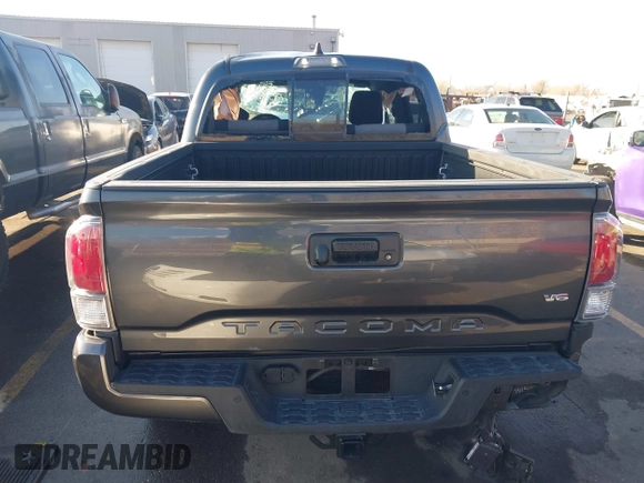 2023 Toyota Tacoma SR with VIN 3TMCZ5AN2PM553928, listed as a IAAI auction lot 40999044 with 9,210 mi miles and . Bid and sale history available at DreamBid. Image 16.