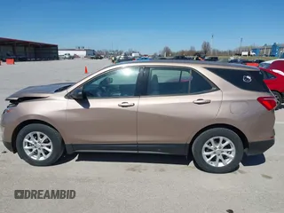 2018 Chevrolet Equinox LS with VIN 2GNAXHEV2J6160948, listed as a IAAI auction lot 41818156 with 152,457 mi miles and . Bid and sale history available at DreamBid. Image 14.