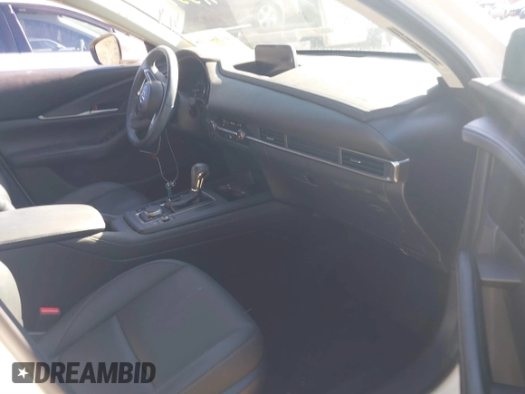 2021 Mazda CX-30 Select with VIN 3MVDMABL3MM239692, listed as a IAAI auction lot 41354738 with 48,928 mi miles and . Bid and sale history available at DreamBid. Image 5.