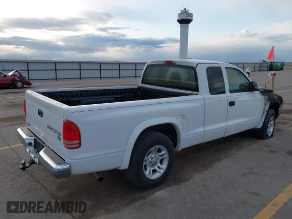 2003 Dodge Dakota SLT z VIN 1D7HL42X33S181413, wystawiony jako IAAI lot #42000892 z przebiegiem Nie podano mil oraz . Historia ofert i sprzedaży dostępna na DreamBid. Obrazek 4.
