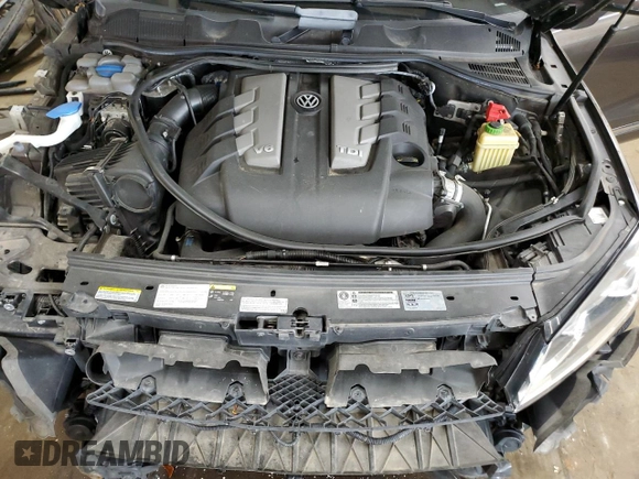 2016 Volkswagen Touareg Sport z VIN WVGEP9BPXGD006774, wystawiony jako Copart lot #56045495 z przebiegiem 85 695 mil mil oraz Szkoda całkowita • Salvage title. Historia ofert i sprzedaży dostępna na DreamBid. Obrazek 11.
