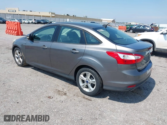 2013 Ford Focus SE with VIN 1FADP3F25DL337961, listed as a IAAI auction lot 42410460 with 143,446 mi miles and . Bid and sale history available at DreamBid. Image 3.
