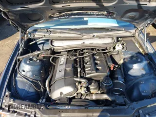 2003 BMW 3 Series 325i with VIN WBAEV33403KL61113, listed as a IAAI auction lot 41775831 with 199,126 mi miles and . Bid and sale history available at DreamBid. Image 10.
