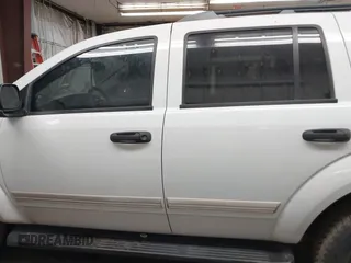 2005 Dodge Durango SLT z VIN 1D4HD48D75F519320, wystawiony jako IAAI lot #42380006 z przebiegiem 84 625 mil mil oraz . Historia ofert i sprzedaży dostępna na DreamBid. Obrazek 14.