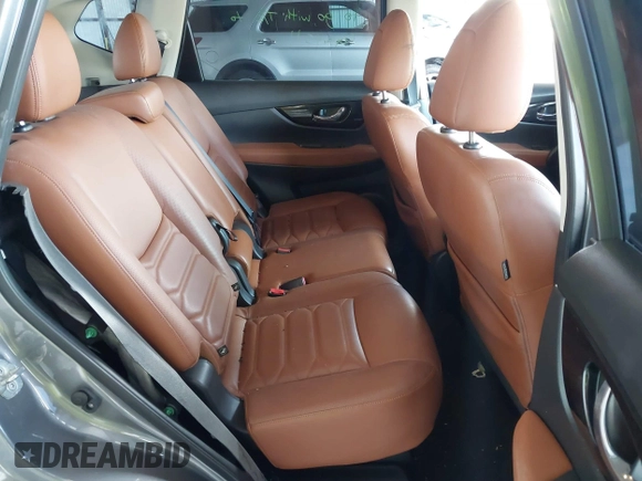 2018 Nissan Rogue SV with VIN JN8AT2MT9JW485804, listed as a IAAI auction lot 41711723 with 74,860 mi miles and . Bid and sale history available at carsss.com. Image 8.