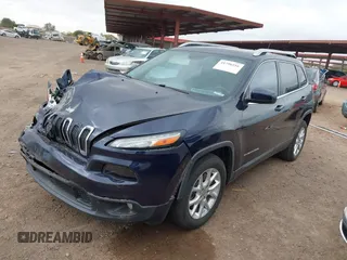 2015 Jeep Cherokee Latitude with VIN 1C4PJLCB8FW506398, listed as a IAAI auction lot 41796516 with 95,204 mi miles and . Bid and sale history available at DreamBid. Image 2.