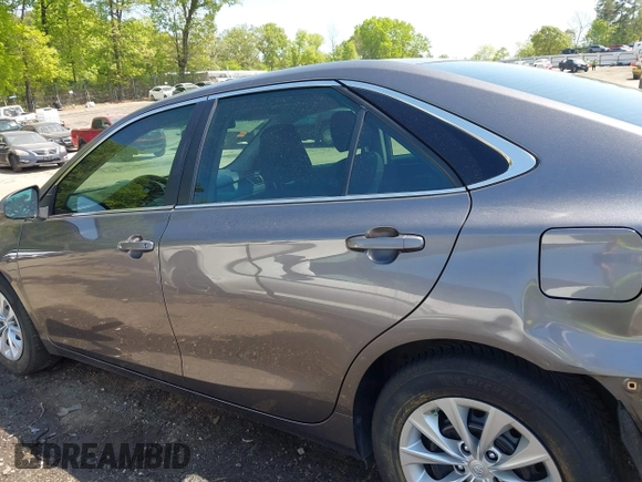 2016 Toyota Camry XLE with VIN 4T4BF1FK4GR557276, listed as a IAAI auction lot 42049650 with 117,529 mi miles and . Bid and sale history available at carsss.com. Image 14.