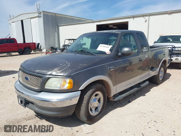 2002 Ford F-150 XL with VIN 1FTRX07L92KC81256, listed as a IAAI auction lot 41765831 with 149,506 mi miles. Bid and sale history available at carsss.com. Image 2.