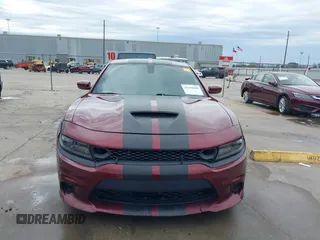 2020 Dodge Charger Scat Pack z VIN 2C3CDXGJ8LH132985, wystawiony jako IAAI lot #41316849 z przebiegiem 66 881 mil mil oraz . Historia ofert i sprzedaży dostępna na DreamBid. Obrazek 12.