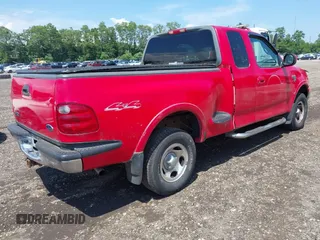 2002 Ford F-150 with VIN 1FTRX08W92KA41519, listed as a IAAI auction lot 42635628 with 160,055 mi miles and . Bid and sale history available at DreamBid. Image 4.