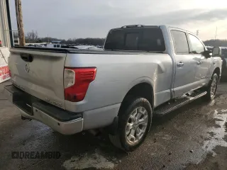 2016 Nissan Titan XD Platinum Reserve with VIN 1N6BA1F46GN513608, listed as a Copart auction lot 39489894 with 158,300 mi miles and Salvage Title. Bid and sale history available at carsss.com. Image 3.