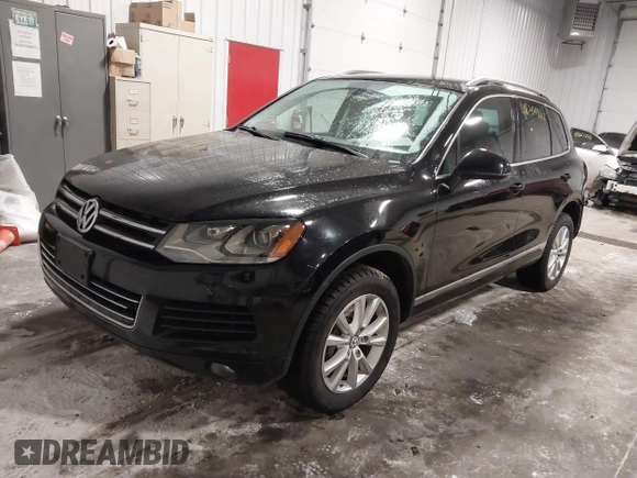 2013 Volkswagen Touareg Exec с VIN WVGEF9BP9DD004013, выставлен на аукционе IAAI как лот 41644882 с пробегом 148 096 миль миль и . История ставок и продаж доступна на DreamBid. Изображение 2.