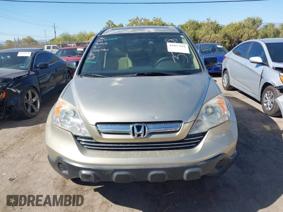 2009 Honda CR-V EX with VIN JHLRE38599C007909, listed as a IAAI auction lot 42077656 with 223,597 mi miles and . Bid and sale history available at carsss.com. Image 12.