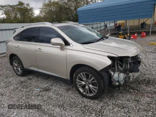 2013 Lexus RX 350 with VIN 2T2ZK1BA1DC097584, listed as a Copart auction lot 50697475 with 214,594 mi miles and Salvage Title. Bid and sale history available at DreamBid. Image 4.