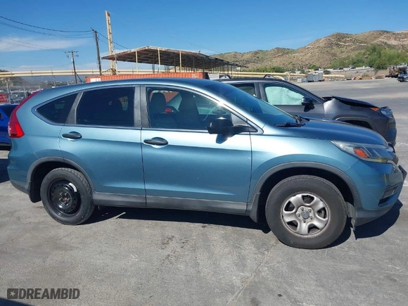 2015 Honda CR-V LX with VIN 2HKRM3H39FH539336, listed as a IAAI auction lot 42000995 with 55,721 mi miles. Bid and sale history available at carsss.com. Image 13.