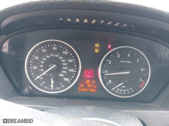 2009 BMW X5 30i with VIN 5UXFE43579L037535, listed as a IAAI auction lot 41715317 with 210,697 mi miles. Bid and sale history available at carsss.com. Image 7.