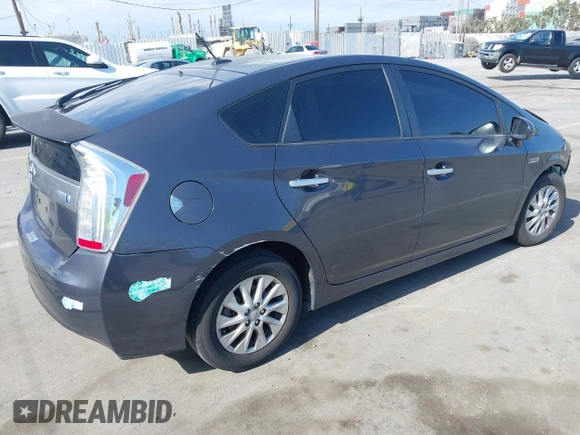 2014 Toyota Prius with VIN JTDKN3DPXE3054379, listed as a IAAI auction lot 42080665 with Not provided miles and . Bid and sale history available at DreamBid. Image 4.
