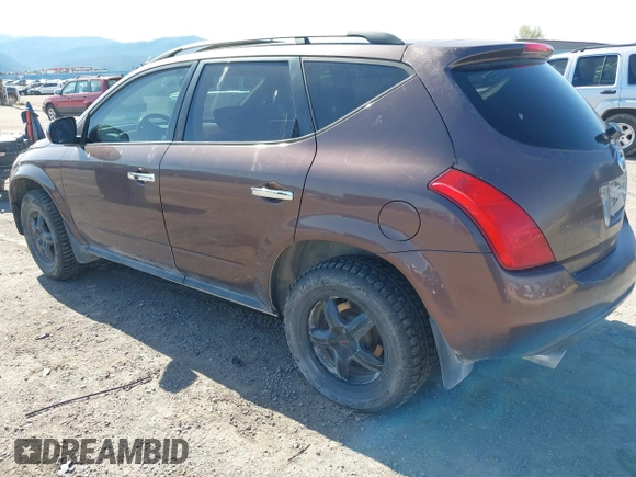 2003 Nissan Murano SL with VIN JN8AZ08W03W218075, listed as a IAAI auction lot 42158632 with 127,762 mi miles and . Bid and sale history available at DreamBid. Image 3.