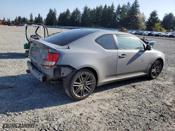 2011 Scion tC with VIN JTKJF5C76B3000765, listed as a Copart auction lot 53954445 with 243,554 mi miles and Salvage Title. Bid and sale history available at carsss.com. Image 3.
