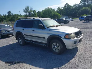 2002 Mitsubishi Montero ES z VIN JA4LS21H62J030859, wystawiony jako IAAI lot #42544667 z przebiegiem 140 170 mil mil oraz . Historia ofert i sprzedaży dostępna na DreamBid. Obrazek 1.