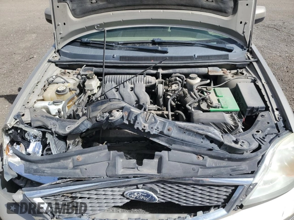2006 Ford Five Hundred SE с VIN 1FAFP23146G150401, выставлен на аукционе Copart как лот 57000605 с пробегом 218 689 миль миль и Списание • Salvage title. История ставок и продаж доступна на DreamBid. Изображение 11.