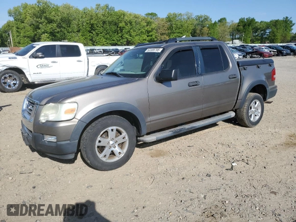 2007 Ford Explorer Sport Trac XLT z VIN 1FMEU31K77UA13757, wystawiony jako Copart lot #53308795 z przebiegiem 205 761 mil mil oraz Czysty tytuł • Clean title. Historia ofert i sprzedaży dostępna na DreamBid. Obrazek 1.