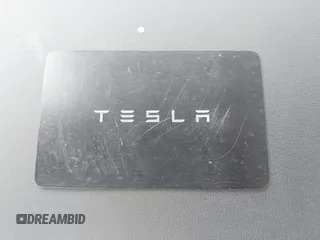 2023 Tesla Model Y Long Range with VIN 7SAYGDEE7PA194998, listed as a IAAI auction lot 41787170 with 16,221 mi miles and . Bid and sale history available at DreamBid. Image 11.
