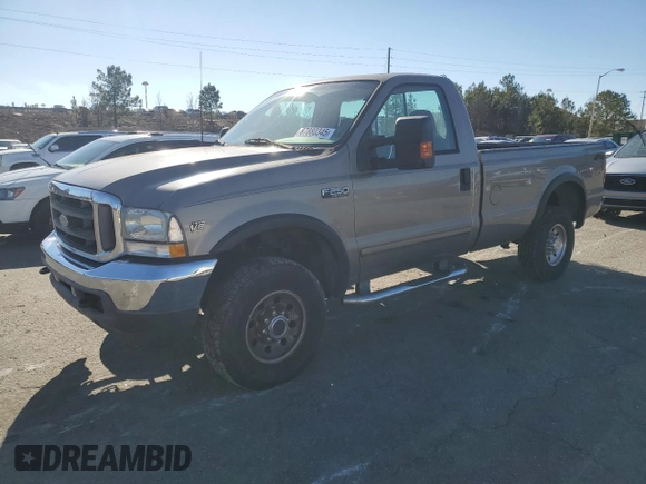 2002 Ford F-250 XL with VIN 1FTNF21L02EA83007, listed as a Copart auction lot 87880345 with 104,889 mi miles and Salvage title. Bid and sale history available at DreamBid. Image 1.