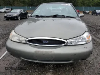 1999 Ford Contour с VIN 1FAFP6538XK164127, выставлен на аукционе Copart как лот 46837275 с пробегом 83 415 миль миль и Списание • Salvage title. История ставок и продаж доступна на DreamBid. Изображение 5.