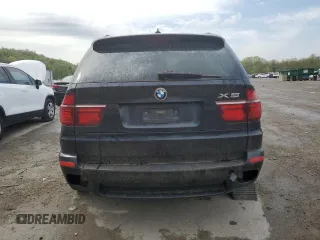 2012 BMW X5 35i z VIN 5UXZV4C5XCL748652, wystawiony jako Copart lot #55457455 z przebiegiem 149 030 mil mil oraz Szkoda całkowita • Salvage title. Historia ofert i sprzedaży dostępna na DreamBid. Obrazek 6.