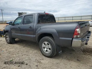 2014 Toyota Tacoma with VIN 3TMLU4EN3EM134468, listed as a Copart auction lot 60686435 with 154,926 mi miles and Salvage title. Bid and sale history available at DreamBid. Image 2.