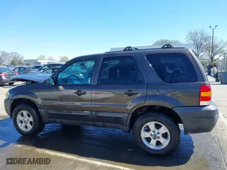 2006 Ford Escape XLT with VIN 1FMCU03116KB57387, listed as a IAAI auction lot 41813041 with 180,417 mi miles. Bid and sale history available at carsss.com. Image 15.
