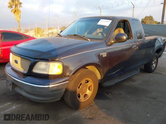 1999 Ford F-150 XL with VIN 1FTRX17L3XKB32547, listed as a IAAI auction lot 41331882 with Not Provided miles. Bid and sale history available at carsss.com. Image 18.