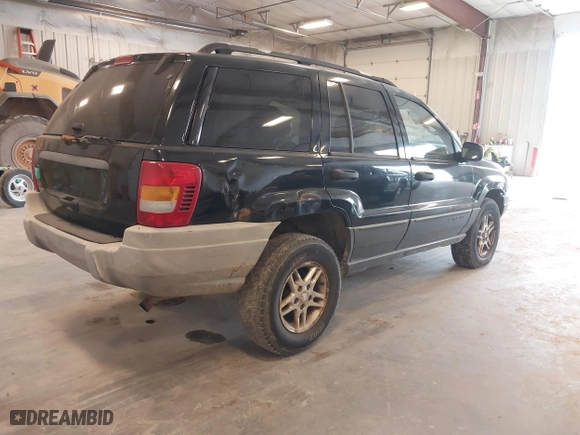 2002 Jeep Grand Cherokee Laredo with VIN 1J4GW48SX2C118434, listed as a IAAI auction lot 42036464 with 187,263 mi miles. Bid and sale history available at carsss.com. Image 4.