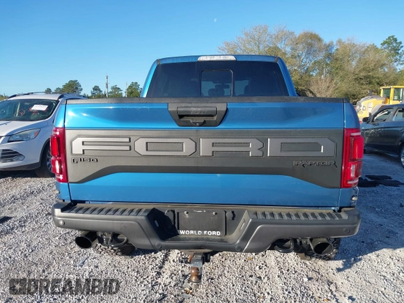 2020 Ford F-150 Raptor with VIN 1FTFW1RG6LFA91517, listed as a IAAI auction lot 41800990 with 112,535 mi miles and . Bid and sale history available at carsss.com. Image 17.