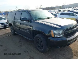 2014 Chevrolet Suburban LT with VIN 1GNSKJE70ER188902, listed as a IAAI auction lot 41208462 with 123,278 mi miles. Bid and sale history available at carsss.com. Image 1.