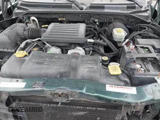 2000 Dodge Dakota Sport with VIN 1B7GL22N6YS764185, listed as a IAAI auction lot 41570275 with 157,334 mi miles. Bid and sale history available at carsss.com. Image 10.
