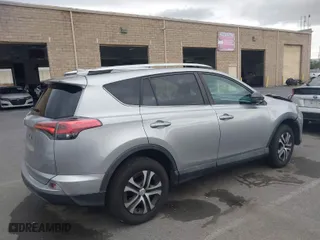 2016 Toyota RAV4 LE with VIN 2T3ZFREV6GW296324, listed as a IAAI auction lot 40922529 with 138,107 mi miles. Bid and sale history available at carsss.com. Image 4.