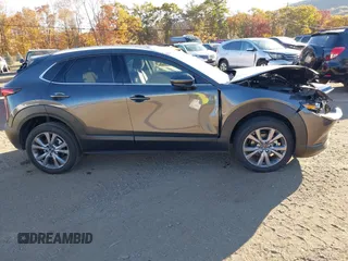 2024 Mazda CX-30 2.5 S Premium Package with VIN 3MVDMBDM2RM693225, listed as a IAAI auction lot 40573761 with 2,792 mi miles. Bid and sale history available at carsss.com. Image 13.