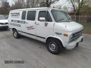1995 Chevrolet Chevy Van z VIN 1GCEG25K2SF159884, wystawiony jako IAAI lot #41947206 z przebiegiem 308 693 mil mil oraz . Historia ofert i sprzedaży dostępna na DreamBid. Obrazek 1.