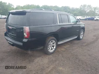 2015 GMC Yukon XL SLT z VIN 1GKS2HKC1FR146778, wystawiony jako IAAI lot #42449315 z przebiegiem 197 577 mil mil oraz . Historia ofert i sprzedaży dostępna na DreamBid. Obrazek 4.
