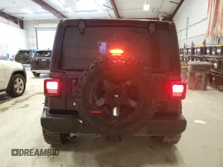 2022 Jeep Wrangler Unlimited Sport with VIN 1C4HJXDG4NW206622, listed as a Copart auction lot 87664525 with 62,240 mi miles and Salvage Title. Bid and sale history available at DreamBid. Image 6.