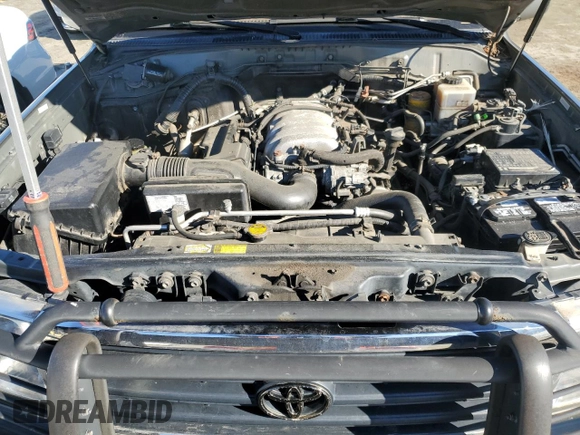 2002 Toyota Land Cruiser z VIN JTEHT05J122024015, wystawiony jako Copart lot #88706765 z przebiegiem Nie podano mil oraz Czysty tytuł • Clean title. Historia ofert i sprzedaży dostępna na DreamBid. Obrazek 11.