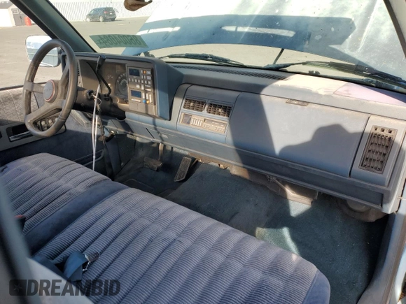 1990 GMC Sierra 1500 with VIN 1GTFC24K2LE554012, listed as a Copart auction lot 86004084 with 174,771 mi miles and Clean Title. Bid and sale history available at DreamBid. Image 8.