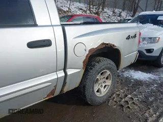 2006 Dodge Dakota SLT with VIN 1D7HW48K16S682999, listed as a IAAI auction lot 41303631 with 133,864 mi miles. Bid and sale history available at carsss.com. Image 16.