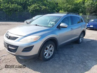 2012 Mazda CX-9 Touring with VIN JM3TB3CV7C0365934, listed as a IAAI auction lot 42381671 with 237,298 mi miles and . Bid and sale history available at DreamBid. Image 2.