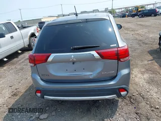 2016 Mitsubishi Outlander SE z VIN JA4AZ3A3XGZ049548, wystawiony jako IAAI lot #42393429 z przebiegiem 74 218 mil mil oraz . Historia ofert i sprzedaży dostępna na DreamBid. Obrazek 16.