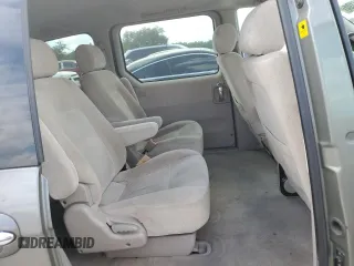 2004 Kia Sedona LX with VIN KNDUP131346575851, listed as a Copart auction lot 73614194 with 153,928 mi miles and Salvage Title. Bid and sale history available at carsss.com. Image 11.