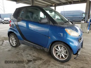 2008 Smart fortwo Pure z VIN WMEEJ31X98K106240, wystawiony jako Copart lot #46756535 z przebiegiem 113 587 mil mil oraz Szkody całkowita. Historia ofert i sprzedaży dostępna na DreamBid. Obrazek 4.